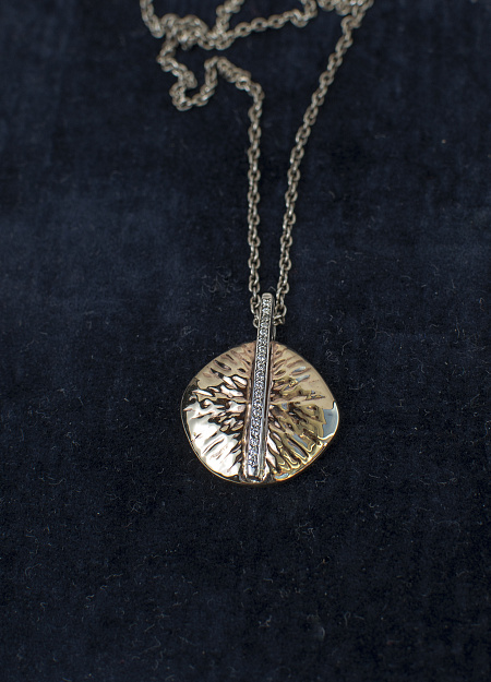 Gold and silver pendant